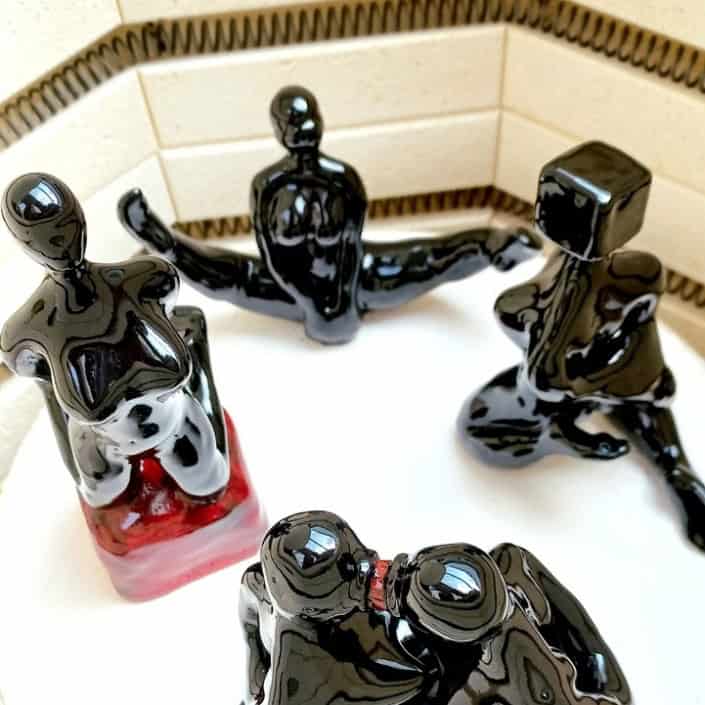Sculptures in the oven Ceramic sculptures with black glaze in the oven